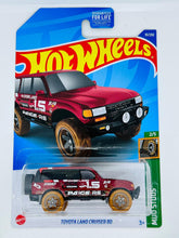 Load image into Gallery viewer, Hot Wheels Toyota Land Cruiser 80 Mud Studs 2/5 91/250
