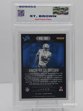 将图片加载到图库查看器，Amon-Ra St. Brown 2021 Panini Illusion Rookie RC #86 Lions Parish 10 GEM Mint
